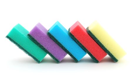 Stack of sponges on white background.の写真素材