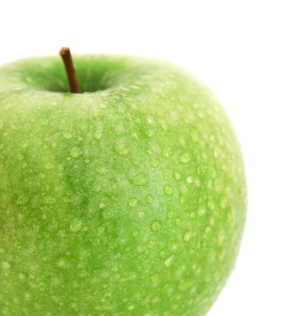 Green apple with water drops の写真素材