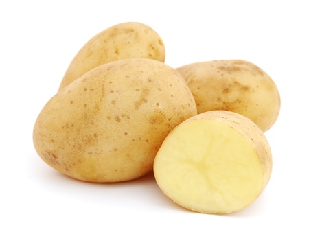 Pile of potatoes isolated on white backgroundの写真素材