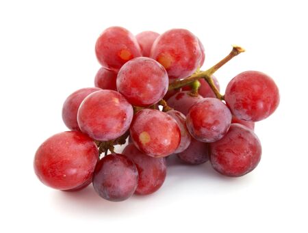 Red grapes isolated on white backgroundの写真素材