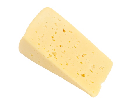 Piece of cheese isolated on white backgroundの写真素材