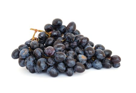 Blue grapes isolated on white backgroundの写真素材