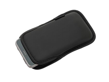 Smartphone in leather case isolated on white backgroundの写真素材
