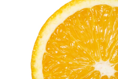 Close-up of slice of an orange isolated on white backgroundの写真素材