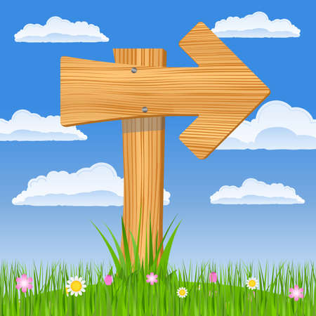 Wooden arrow on the blue sky backgroundの写真素材