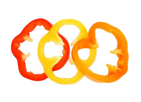 Slices of bell peppers isolated on white backgroundの写真素材