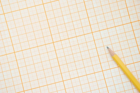 Graph paper with pencil, top viewの写真素材