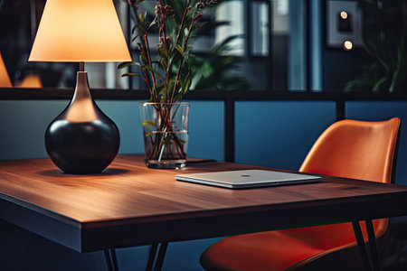 Laptop and desk lamp on wooden table, Generative AIの素材