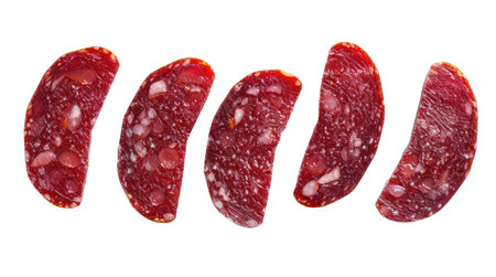 Salami slices isolated on white backgroundの素材