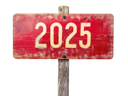 New year number 2025 written on red wooden signboard, isolated on white backgroundの素材