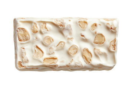 Bar of nougat with nuts isolated on white backgroundの素材