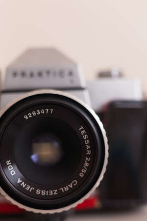 SLR film camera Praktica ltl and 50mm 2.8 Carl Zeiss Jena lens. Retro toning. (March 14, 2021, Uzhgorod, Ukraine)のeditorial素材