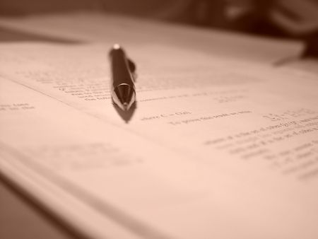 Mathematical paper with a pencil on it. Sepia toning. Shallow depth of field.の写真素材