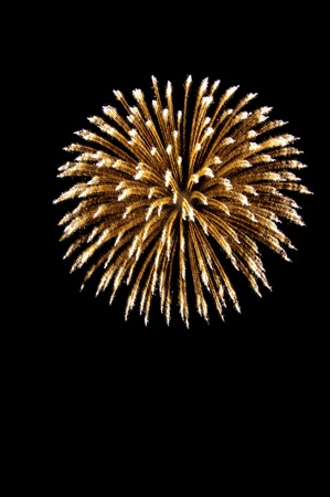 A spherical break of stars. Firework rocket. Isolated on a black background.の写真素材