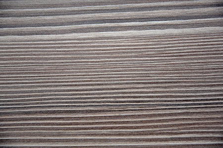 Grainy light brown wood background texture