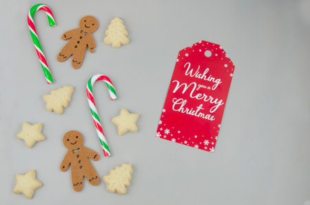 Gingerbread men and biscuits, christmas message, red