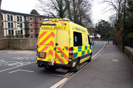 Ambulance waits outside residence, Sheffieldの写真素材