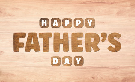 Happy Father's Day Wooden lettering on light wooden backgroundの写真素材