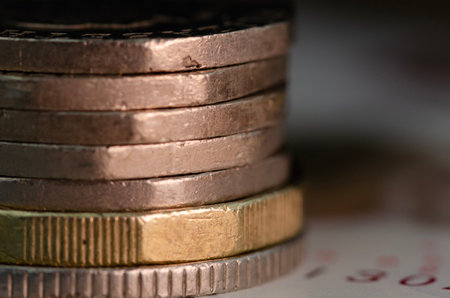 Close up side view of stack of coins. Macro photoの写真素材
