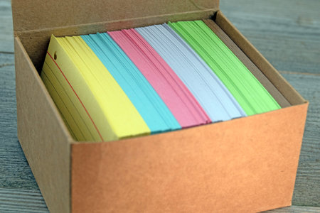 Close up image of brown box with coloured blank index cards Copy spaceの写真素材