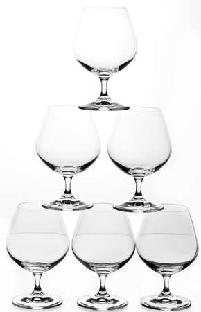 Group of empty wine glass. Isolated on a white background. Black and white image.の写真素材