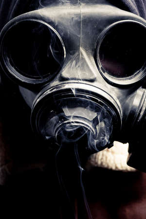 Portrait man in gas mask  