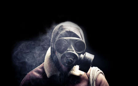 Portrait man in gas mask  の写真素材