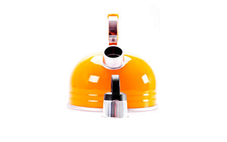 Orange  tea kettle isolated on white backgroundの写真素材