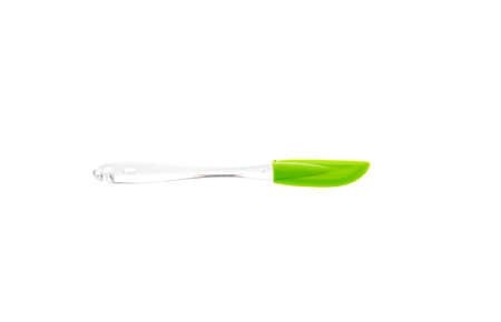 green spatula with a plastic handle on a white background. Clipping path included.の写真素材