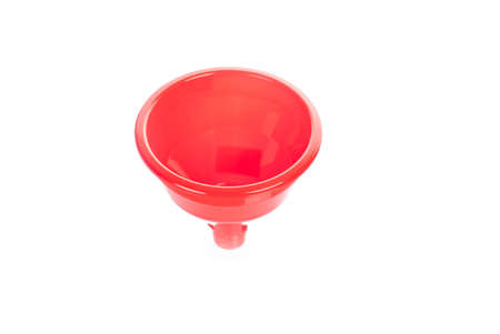 Plastic kitchen funnel, isolated on a white background.の写真素材