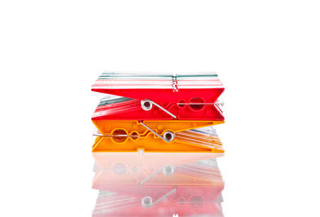 Four colored clothespin set isolated on white backgroundの写真素材