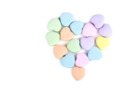 A mosaic heart made of valentine candyの写真素材