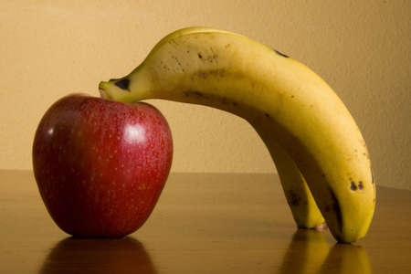 bananas on a red appleの写真素材