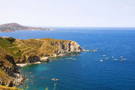 view of the French coast, there is a small bay with yachts, vacation spotの写真素材