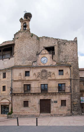 edificiio view of City Hall in Sepulveda, can be a belfry with storks nest in an old building that seems to have stuck a new facadeの写真素材