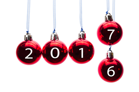 Red christmas balls old to new year 2017 isolated on white backgroundの写真素材
