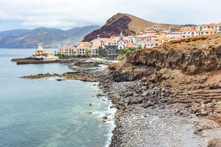 Coast Madeira with sea and villageの写真素材