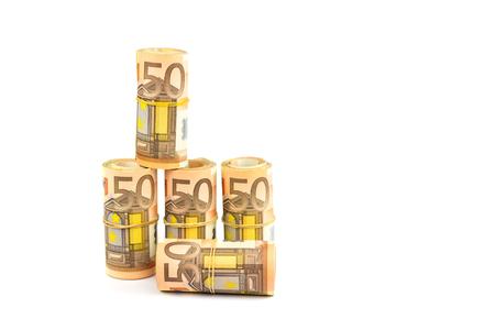 Rolls of euro money isolated on white backgroundの写真素材