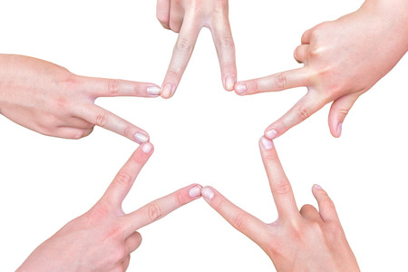 Hands of girls making five pointed star isolated on white backgroundの写真素材