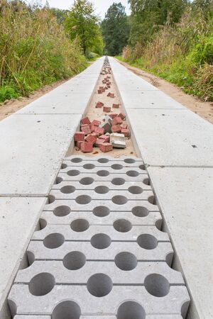 New construction of concrete road in natural environmentの写真素材