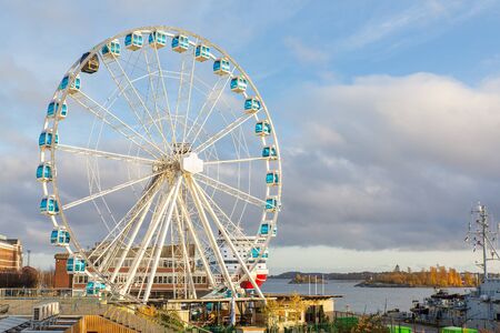 Uban landscape with finnish ferris wheel near sea in Helsinkiの写真素材