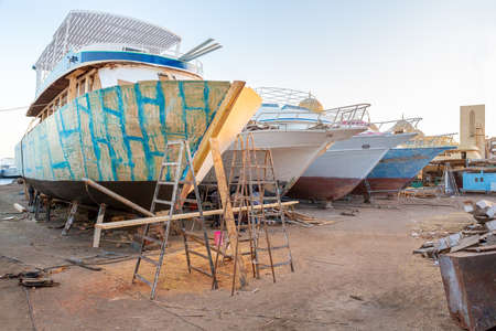 Group of pleasure boats under construction at shipyard in city Hurghada Egypt