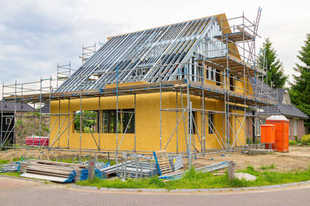 New house under construction on building siteの写真素材