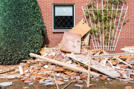 Renovations at european home with debris in gardenの写真素材