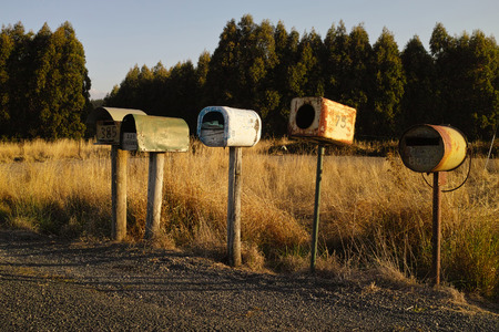 A row of custom made mailboxen somewhere in Tasmania.の写真素材