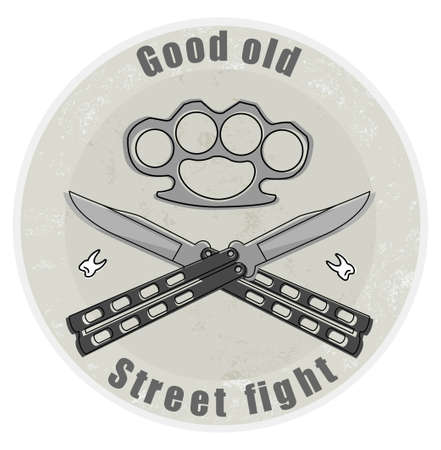 Crossed butterfly knifes with steel brass knuckle and broken teeth emblemのイラスト素材