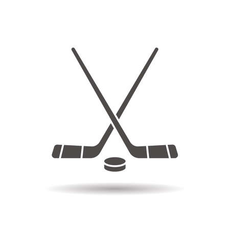 Hockey game equipment icon. Drop shadow silhouette symbol. Hockey sticks and puck. Negative space. Vector isolated illustrationのイラスト素材