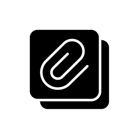 Enclosure black glyph icon. Attachment of different personal data files. Sending images and videos. Mobile interface items. Silhouette symbol on white space. Vector isolated illustrationのイラスト素材
