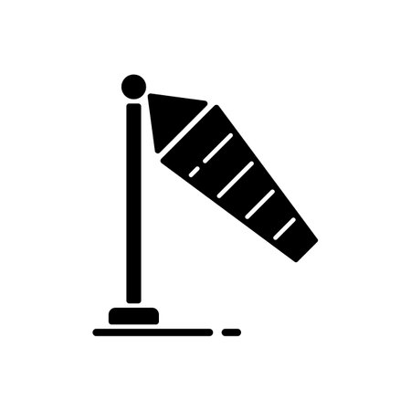 Windsock black glyph icon. Wind direction and speed. Conical textile tube. Compass point. Wind cone. Airfield, airport. Silhouette symbol on white space. Vector isolated illustrationのイラスト素材