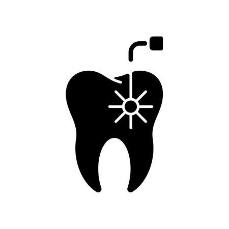 Laser dental procedures black glyph icon. Tooth laser dentistry. Instruments for dental treatment. Dental equipment. Tooth recovery. Silhouette symbol on white space.Vector isolated illustrationのイラスト素材